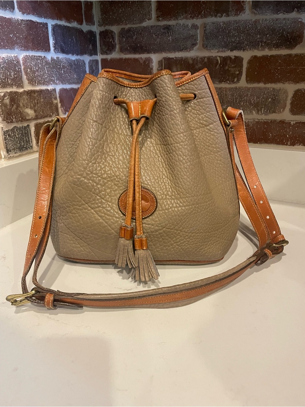 Vintage Dooney & Bourke Taupe Pebbled Leather Drawstring Bucket Bag